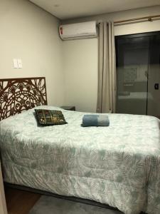 Una cama o camas en una habitación de Loft aconchegante e funcional no Campeche