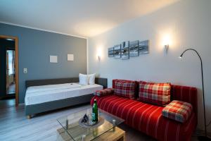 Postel nebo postele na pokoji v ubytování Hotel Stadtkrug