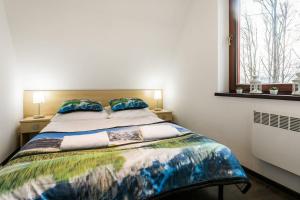 Posteľ alebo postele v izbe v ubytovaní Apartament w malowniczej Dolinie Kościeliskiej by Rent like home