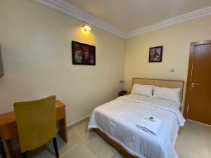 Letto o letti in una camera di MOK Apartments & Suites