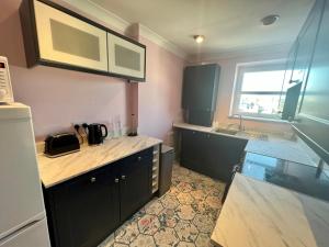 Køkken eller tekøkken på Skyline Oasis