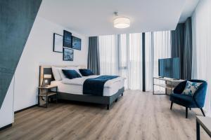 Rúm í herbergi á YParc Hôtel
