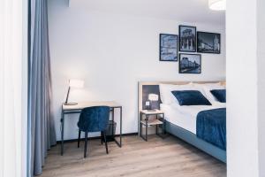 Rúm í herbergi á YParc Hôtel