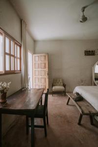Postel nebo postele na pokoji v ubytování Casa Mezcla - Bed & Breakfast + 17 fotografií