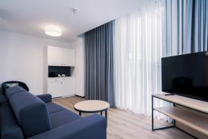 Sjónvarps- og/eða afþreyingartæki á YParc Hôtel