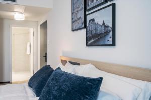 Rúm í herbergi á YParc Hôtel