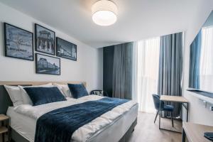 Rúm í herbergi á YParc Hôtel