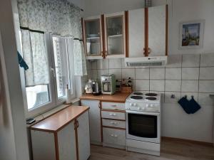 Kuchyňa alebo kuchynka v ubytovaní Beach House + 13 fotografií