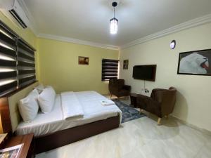 TV o dispositivi per l'intrattenimento presso MOK Apartments & Suites