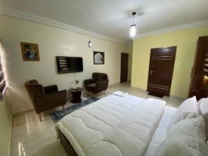 TV o dispositivi per l'intrattenimento presso MOK Apartments & Suites