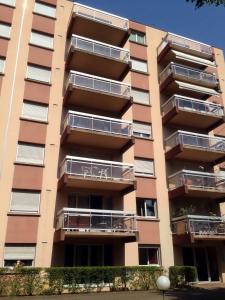 an apartment building with balconies on it at Appartement Monplaisir Part Dieu in Lyon
