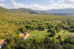 an aerial view of a house in a field of trees at SOKOL - Secret forest house in Gračac