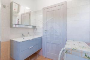 Koupelna v ubytování Casa Marida tra Cotoncello e Sant'Andrea - Goelba
