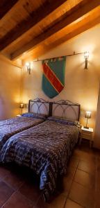 A bed or beds in a room at LAS CALLEJUELAS