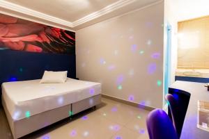 Postel nebo postele na pokoji v ubytování Motel Maresias - Radial Leste