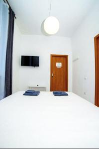 Posteľ alebo postele v izbe v ubytovaní Atlas Hotel
