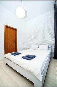Posteľ alebo postele v izbe v ubytovaní Atlas Hotel