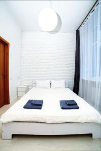 Posteľ alebo postele v izbe v ubytovaní Atlas Hotel