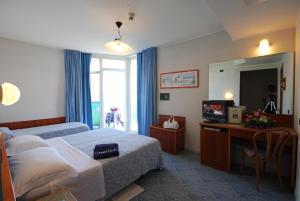 Postel nebo postele na pokoji v ubytování Hotel Meripol
