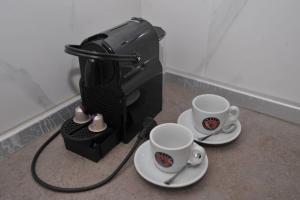 Coffee and tea making facilities at Lux Apartman "Gold" - Cacak