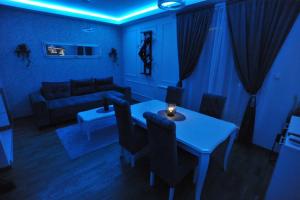 A seating area at Lux Apartman "Gold" - Cacak