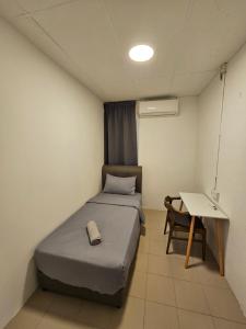 Postel nebo postele na pokoji v ubytování SS HOSTEL PENANG