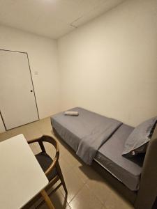 Postel nebo postele na pokoji v ubytování SS HOSTEL PENANG