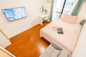 Televisor o centre d'entreteniment de 新宿区歌舞伎町舒适露台房源徒步3分钟地铁站