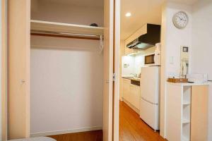 Cuina o zona de cuina de 新宿区歌舞伎町舒适露台房源徒步3分钟地铁站