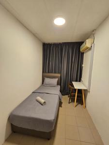 Postel nebo postele na pokoji v ubytování SS HOSTEL PENANG