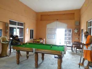 a group of people playing with a pool table at Sukha's Sepna Village in Ajmer