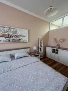 Postel nebo postele na pokoji v ubytování Apartman Teodora