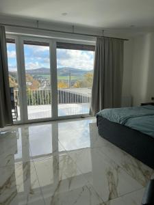 Ένα ή περισσότερα κρεβάτια σε δωμάτιο στο Hamdanes Apartment