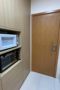 Kuchyň nebo kuchyňský kout v ubytování Flat no Mana Beach Experience + 7 fotografií