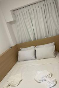 Postel nebo postele na pokoji v ubytování Flat no Mana Beach Experience