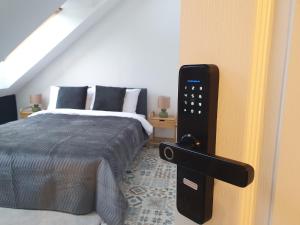 a bedroom with a bed in a room at WE STAY APARTMENTS in Bratislava +14 photos