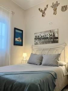 Ένα ή περισσότερα κρεβάτια σε δωμάτιο στο Agarimo Homes - Tu hogar lejos de casa