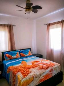 Postel nebo postele na pokoji v ubytování Casa Daniel, incantevole appartamento con piscina a soli 350 mt dalla spiaggia pubblica di Bayahibe