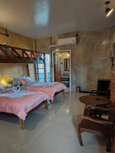Katil atau katil-katil dalam bilik di Smilingface guesthouse