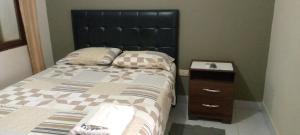 Posteľ alebo postele v izbe v ubytovaní Hostal Amaca