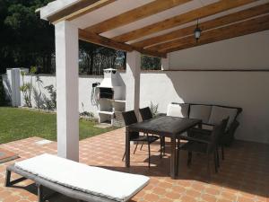 Patio nebo venkovní prostory v ubytování VillaConil