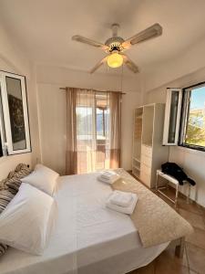 Ένα ή περισσότερα κρεβάτια σε δωμάτιο στο Villa Luna +51 φωτογραφίες