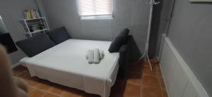 Postel nebo postele na pokoji v ubytování VillaConil