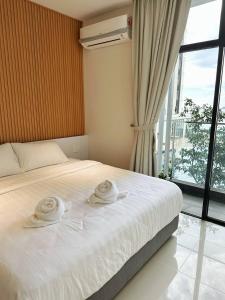 Gallery image of Seaside Pool View Studio Apartment at Kota Kinabalu City Centre in Kota Kinabalu +26 photos