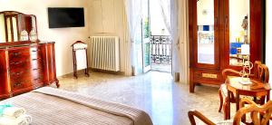 Voodi või voodid majutusasutuse Suite la terrazza di Don Peppino toas