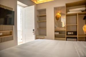 En eller flere senger på et rom på Hotel Casa La Mantilla by Faranda Boutique