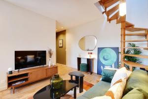 TV a/nebo společenská místnost v ubytování Luxury Duplex