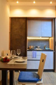 Cucina o angolo cottura di Aria Alpina Guest House Affittacamere
