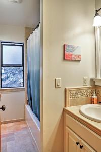 a bathroom with a sink and a window at Truckee Northstar Family Home By Jaeger Retreat in Truckee