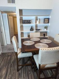 a dining room with a table and two chairs at 2 Bed 2 Bath with pool and spa in Phoenix